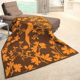 Angelohome Mandarin Color Aviary Woven Throw (Brown, orangeMaterials 86 percent acrylic, 7 percent cotton, 7 percent polyesterCare instructions Machine wash, tumble dry Dimensions 55 inches wide x 70 inches long 100 percent made in GermanyThe digital 