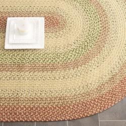 Hand woven Reversible Rust/ Ivory Braided Rug (9 X 12 Oval)