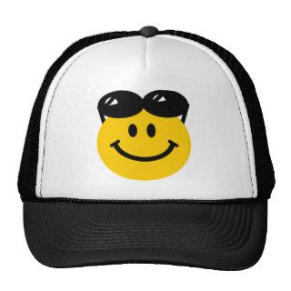 Sunglasses perched on top of head smiley face mesh hat