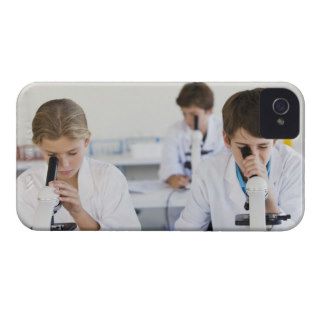 Students looking through microscopes iPhone 4 cases
