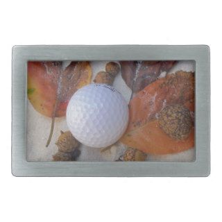 fall leaves and golf ball in sand trap belt buckle