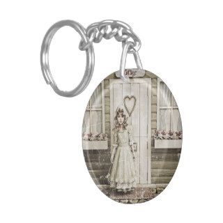 Vintage Girl standing near a Retro Cottage Key Chain