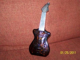Avon Brown Bottle shaped like a "ELECTRIC GUITAR" (Empty) 1974 1975 Period  Decorative Bottles  