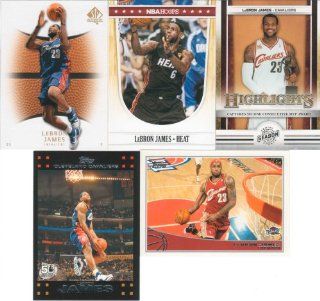 Lebron James 5 Card Gift Lot Containing One Each of His 2011 2012 Hoops Miami Heat and 2007 Topps, 2009 Topps, 2007 SP Authentic and 2010 2011 Panini Season Update Mint Condition Cleveland Cavaliers Cards. Nice Mix Picturing Him in His Red, White and Blue 