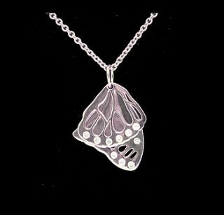 butterfly wings necklace with cz in silver by strange of london jewellery