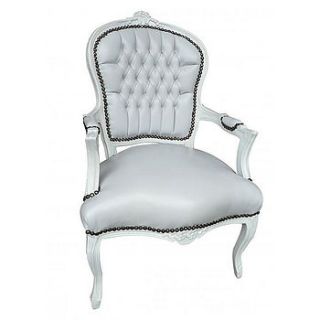 shiny white leatherette studded armchair by out there interiors