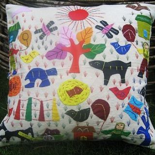 folksy village scene cushion by the fairground