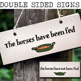 wooden sign 'the horses have been fed' by angelic hen