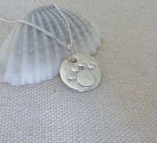 silver paw print pendant and chain by anne reeves jewellery