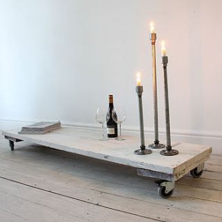 white reclaimed wood low table on castors by inspirit