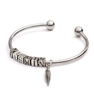 personalised name bangle with feather charm by cinderela b jewellery