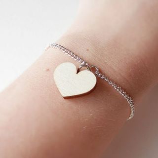 wooden heart bracelet by kate rowland illustration