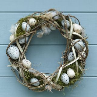easter egg and feather wreath by the contemporary home