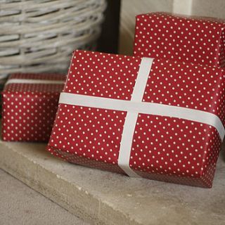 red polka dot wrapping paper sold as a roll by the wedding of my dreams