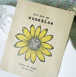 personalised sunflower seed packet favour by wedding in a teacup