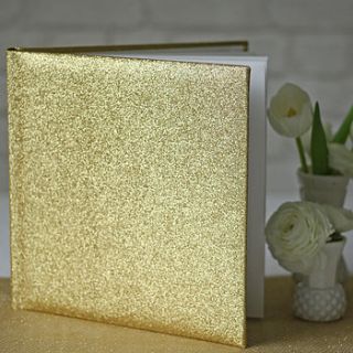 gold glitter wedding guest book by the wedding of my dreams