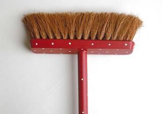 hand painted polka dot brooms by the painted broom company