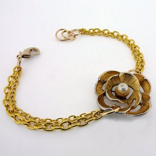 golden flower bracelet by rachel helen designs