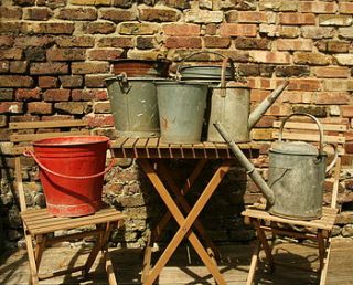 vintage buckets and watering cans by homestead store