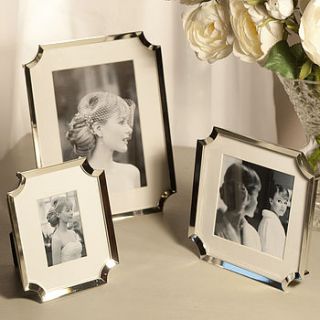 silver picture frame with curved corners by jodie byrne