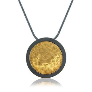 oxidised silver giraffe pendant by charlotte lowe jewellery