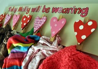 personalised wooden clothes peg board by angelic hen