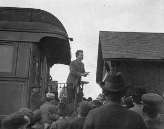 1900 photo Robert M. La Follette speaking from rear platform of train in his e3  