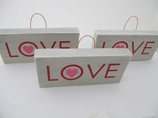 wooden hand painted love sign by edamay