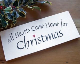 'all hearts come home for christmas' sign by the painted broom company
