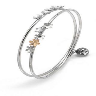 sterling silver and 9ct gold flower bangle by ella georgia