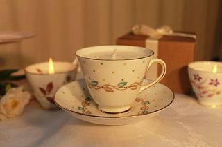 leaves and dots vintage teacup candle by teacup candles