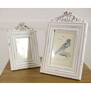 white wooden antique style photo frame by the orchard