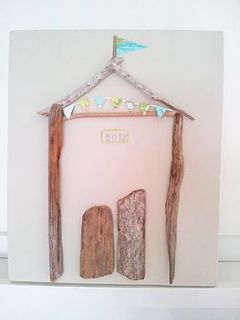 driftwood and map bunting beach hut art by sundaebest