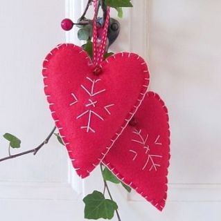 pair of embroidered felt hearts by cherish