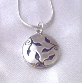 leaves design round silver pendant by dale virginia designs