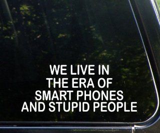 We Live In The Era Of Smart Phones and Stupid People (8 3/4" x 3 1/2") Funny Die Cut Decal Sticker For Windows, Cars, Trucks, Laptops, Etc. Automotive