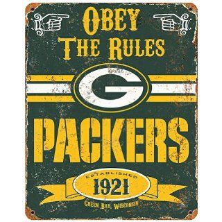 Shop NFL Football Greenbay Packers Logo Vintage Obey Rules Metal Sign Home Decor at the  Home Dcor Store. Find the latest styles with the lowest prices from Party Animal