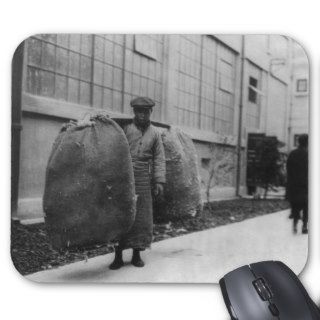 Chinese Man Carrying 200 lbs. of Cotton Mouse Pads