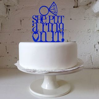 'she put a ring on it' cake topper by miss cake