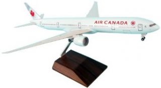 Daron Skymarks Air Canada B777 300Er Model Kit with Gear and Wood (1/200 Scale) Toys & Games