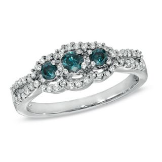 CT. T.W. Enhanced Blue and White Diamond Three Stone Ring in 10K