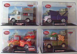 Disney Cars 2 Lightning Mater Chase Edition, Taco Truck Mater, Dracula Mater, and Materhosen Mater Collector Bundle Toys & Games