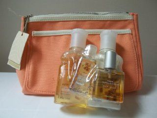 Bath and Body Works Warm Vanilla Sugar Gift Bag, containing shower gel, 4 oz; body lotion, 4 oz; eau de toilette, 0.5 fl oz; and anti bacterial pocketbac hand gel, 1 oz; in a travel/cosmetic bag  Skin Care Product Sets  Beauty
