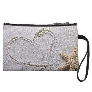 Heart Drawn in Sand at Beach w Starfish Template Wristlet Clutches