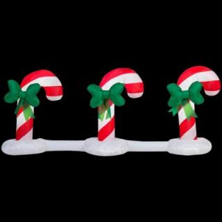 Home Accents Holiday 66.14 in. W x 14.57 in. D x 24.02 in. H Lighted Inflatable Candy Cane Pathway (3 Count) 39395